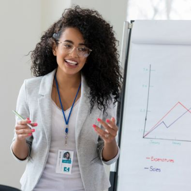 Person Presenting Statistics on a Flipchart